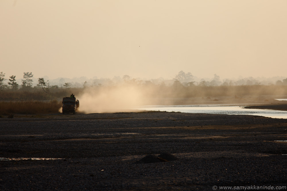 truck river sand