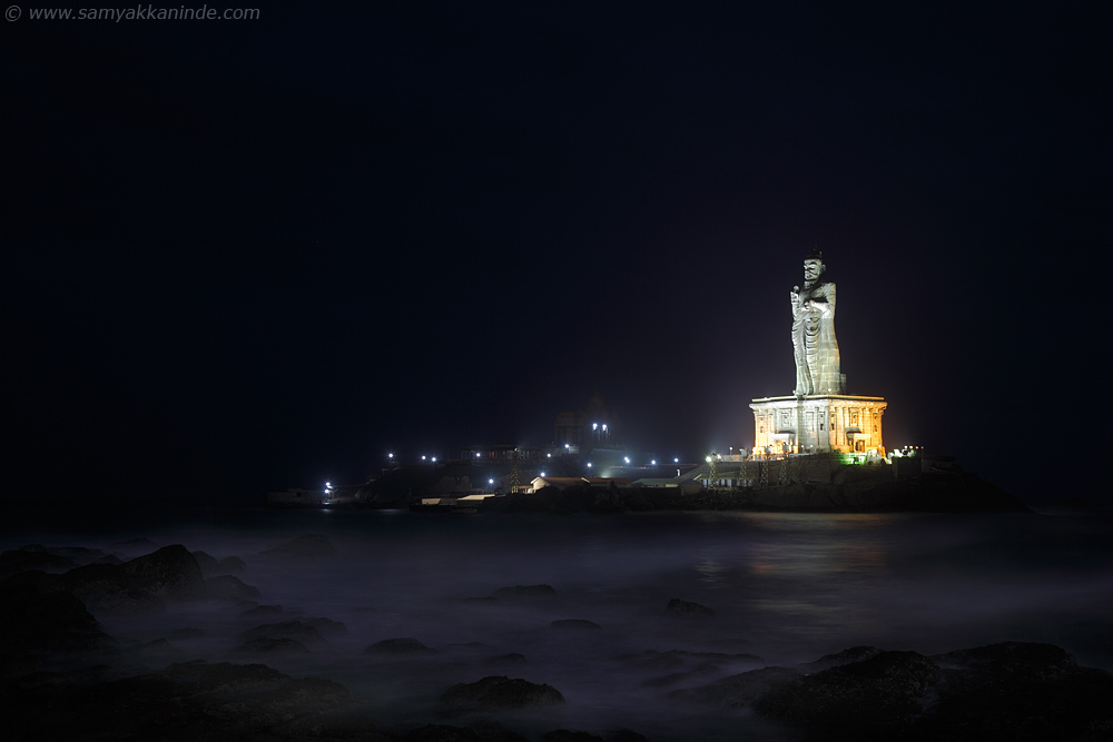 The Thiruvalluvar statue and Vivekanada Rock memorial in the lighting in night.